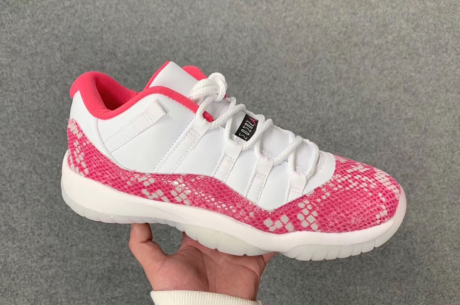 white and pink low top 11s